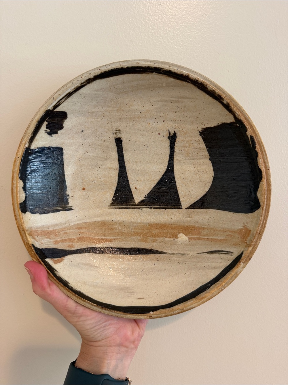 Handmade Rustic Abstract Pottery Bowl in Black and Cream with Artists Stamp.